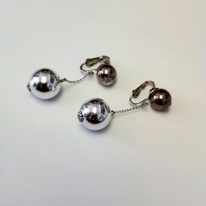 Vintage costume clip on earrings by vogue